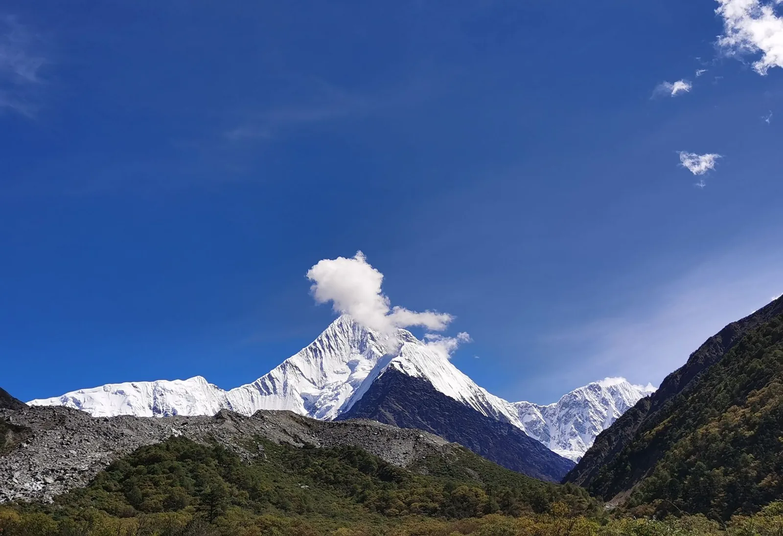 A snow peak above the valley