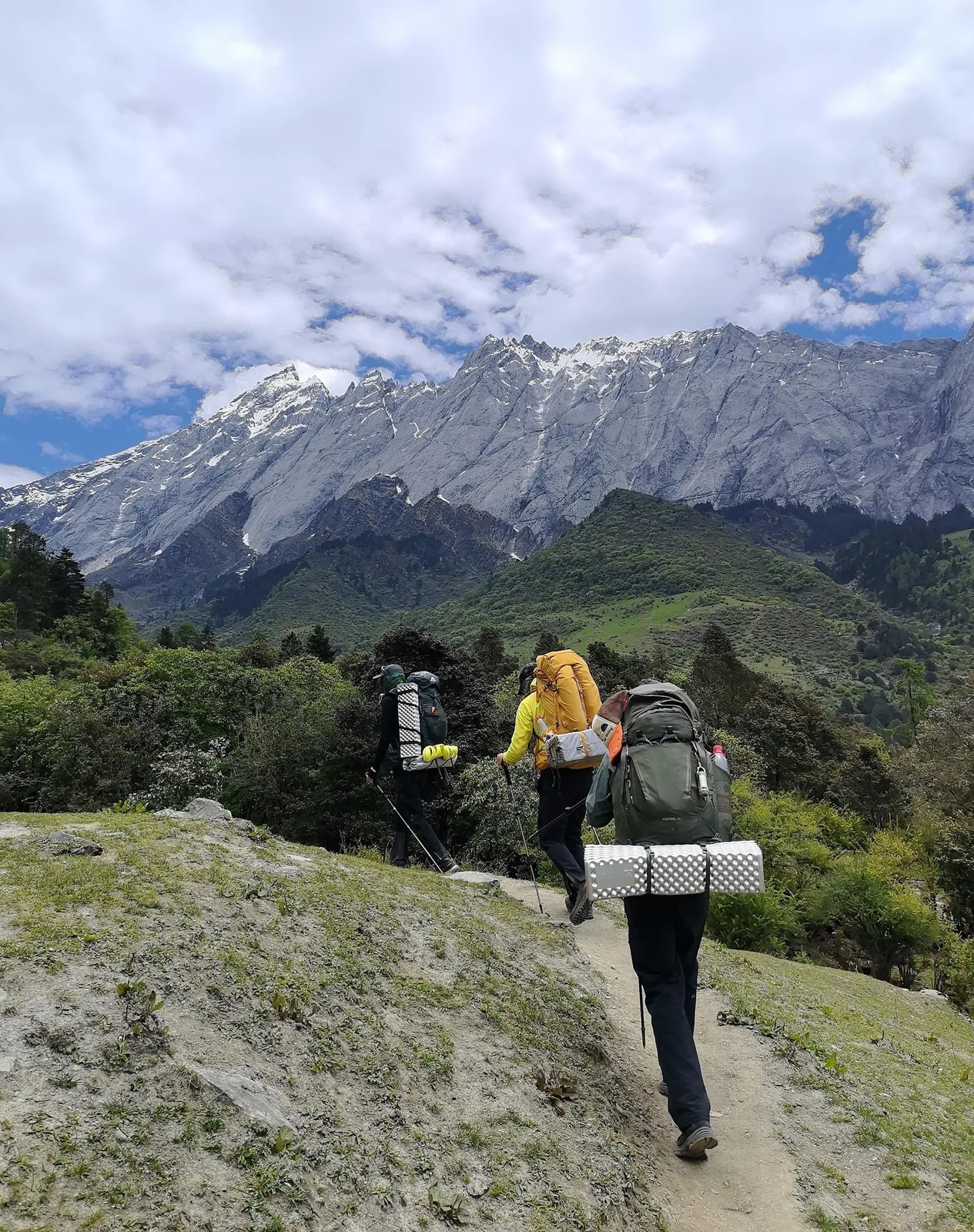 Hikers under the west wall